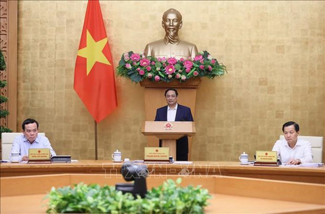 Prime Minister Pham Minh Chinh speaks at the meeting (Photo: VNA)