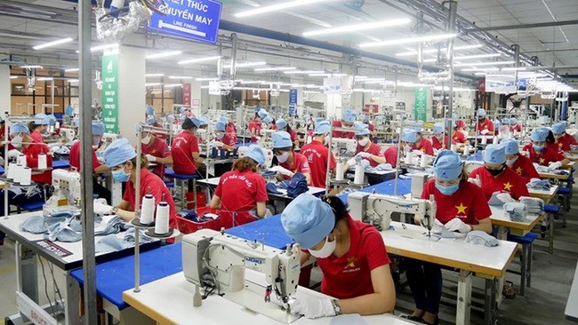 Producing textiles and garments for export at the Garment 10 Corporation Joint Stock Company.