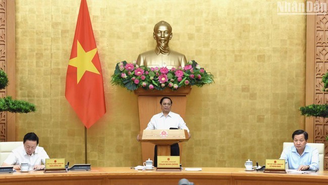 Prime Minister Pham Minh Chinh chairs a Government session on law-building on July 26. (Photo: NDO)