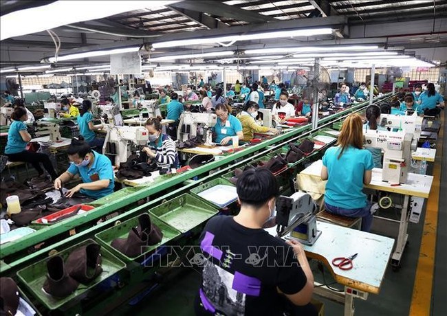 Vietnam's growth is underpinned by diverse sectors, from high-tech manufacturing to natural resources, and bolstered by significant trade relationships, especially with the US and China. (Illustrative photo - Source: VNA)