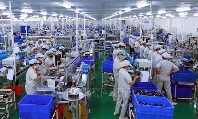 Production at the Japanese-funded NMS Vietnam company. (Photo: VNA)