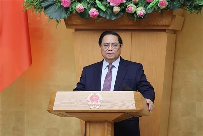PM Pham Minh Chinh speaks at the Government's session on law building on February 27. (Photo: VNA)