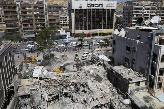 The site of the attack on Iran's Consulate General in Damascus, Syria, on April 2 (Photo: AFP/VNA)