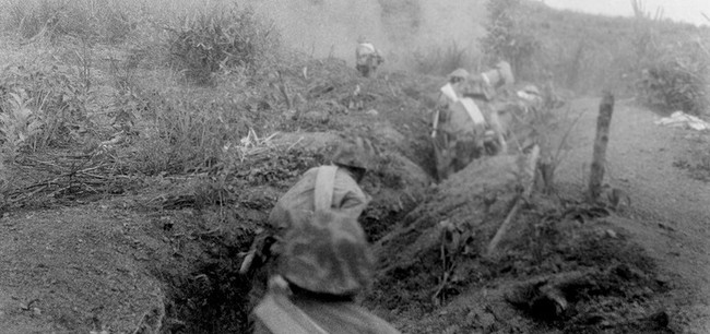 After the artillery fire stopped, assault soldiers took advantage of the topography to advance close to the enemy positions on Him Lam Hill and destroyed the enemy positions here on March 13, 1954, the opening day of the campaign. (File photo/Source: VNA)