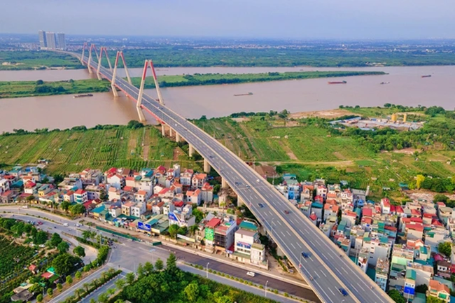 The development direction of the city across the Red River includes the entire administrative boundaries of Dong Anh, Soc Son, and Me Linh districts. (Photo: thanhnien.vn)