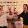 IDEO project - Deaf children receive sign language assistance