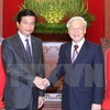 Party leader receives Lao diplomat