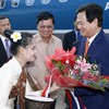 Prime Minister meets Vietnamese investors in Laos