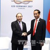 Vietnam - APEC to G20 in an uncertain world