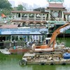 Boathouses on West Lake to be dismantled