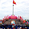 Flag-raising ceremony marks National Reunification day