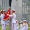 Flag-raising ceremony to pay tribute to the late General Secretary Do Muoi