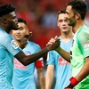 Adan penalty heroics help Atletico edge Arsenal in Singapore