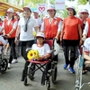 City: Over 5,000 walk for AO victims, people with disabilities