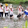 Students in Quang Ngai cross river to attend school