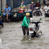 High tides flood HCM City streets