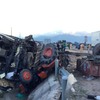 One dies, 21 injured in truck-tractor accident