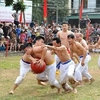Village men wrestle for ball in unique festival in Hanoi