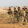 Kurdish forces withdraw from border region in North Syria