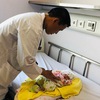 Lao new-born flown to Hanoi for heart operation