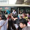 Bus stations crowded as people leave Hanoi for Hung Kings commemoration holiday