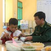 Border soldiers help poor children access education