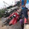 Road collapses after container truck breaks water pipeline