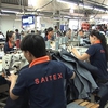 High-level Swiss delegation visits garment factory in Đồng Nai
