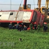 One dead and four injured after sleeper bus overturns