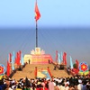 Flag- raising ceremony in Quang Tri marks National Reunification Day