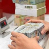Reference exchange rate up 5 VND on February 6