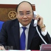 PM Nguyen Xuan Phuc talks on phone with Australian counterpart