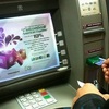 HCM City banks to ensure ATMs cope with extra demand during Tết