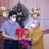 Go'vt committee accompanies Buddhist dignitaries, followers in HCM City COVID-19 fight: Official