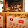 Vietnam offers Laos further aid to cope with COVID-19