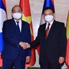 Vietnamese President Nguyen Xuan Phuc meets with Chairman of Lao NA