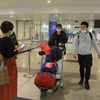 Third flight carrying Vietnamese in Ukraine lands in Hanoi