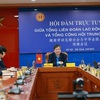 Vietnam, China exchange experience in trade union activities