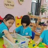 Kindergarten students in Hanoi return to school