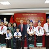 Scholarships given to disadvantaged oversea-Vietnamese students in Laos