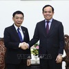 Deputy Prime Minister Tran Luu Quang receives Lao Minister of Home Affairs