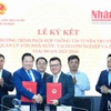 Nhan Dan signs information cooperation with State Capital Management Commission