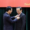 Ho Chi Minh City Party Secretary receive senior Party membership badge