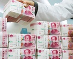 Các ngân hàng Trung Quốc “bán mình” để giải quyết nợ xấu