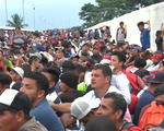Đoàn người tị nạn bắt đầu đổ bộ Mexico