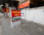 Hàng ăn, uống đường phố Hà Nội đóng cửa, quán trong nhà dựng vách ngăn