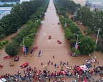 Thêm nhiều người thiệt mạng do mưa lũ, Trung Quốc nâng mức cảnh báo
