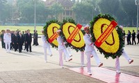 Leaders pay tribute to late leader, martyrs on National Day