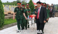 Remains of 25 volunteer soldiers and experts reburied in Dien Bien