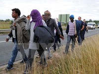 Đụng độ giữa cảnh sát và người di cư tại Calais (Pháp)